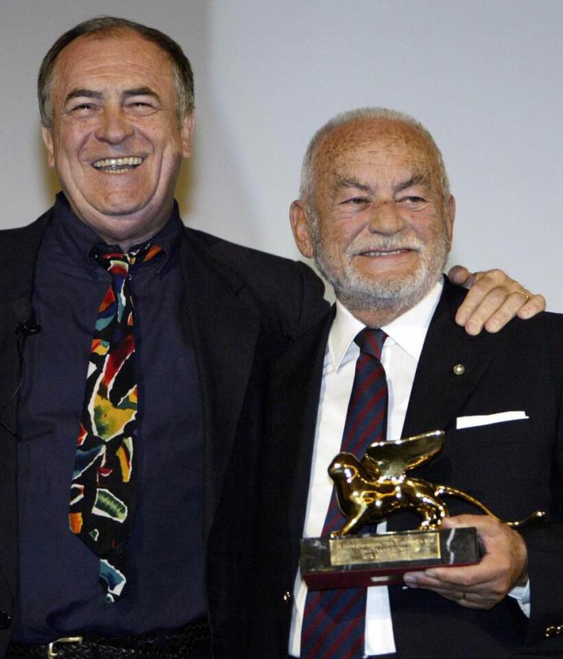 Bernardo Bertolucci and Dino De Laurentiis the 60th International Venice Film Festival.