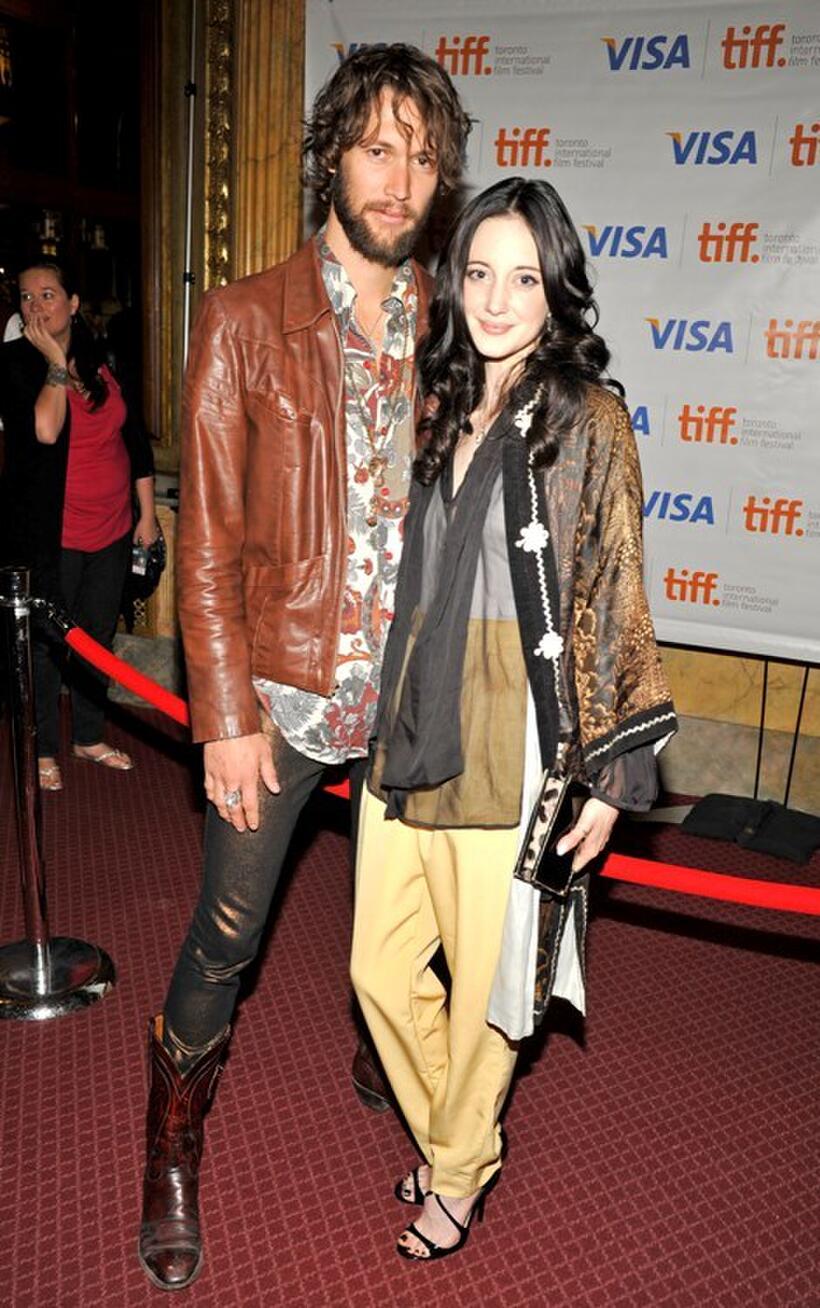Andrea Riseborough and Guest at the premiere of "Made In Dagenham" during the 35th Toronto International Film Festival.