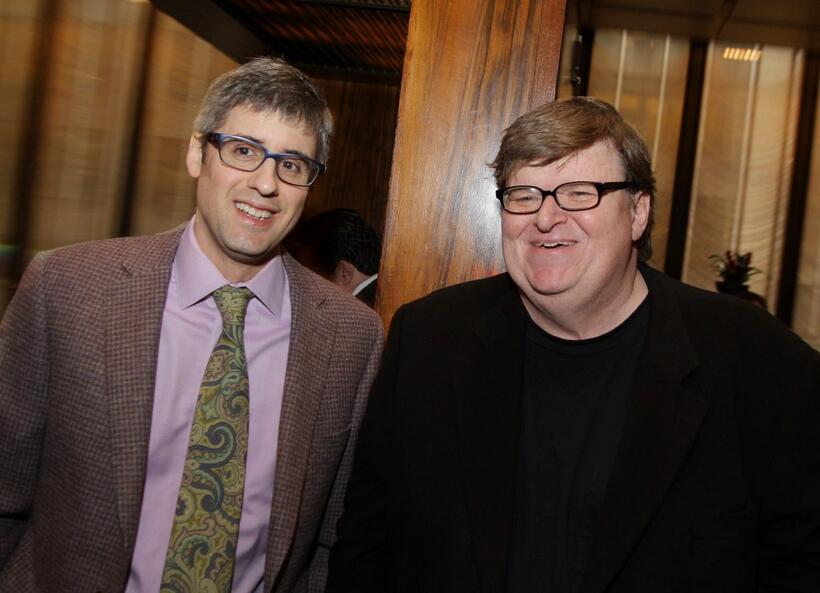 Mo Rocca and Michael Moore at the luncheon celebrating Moore's documentary "Sicko."