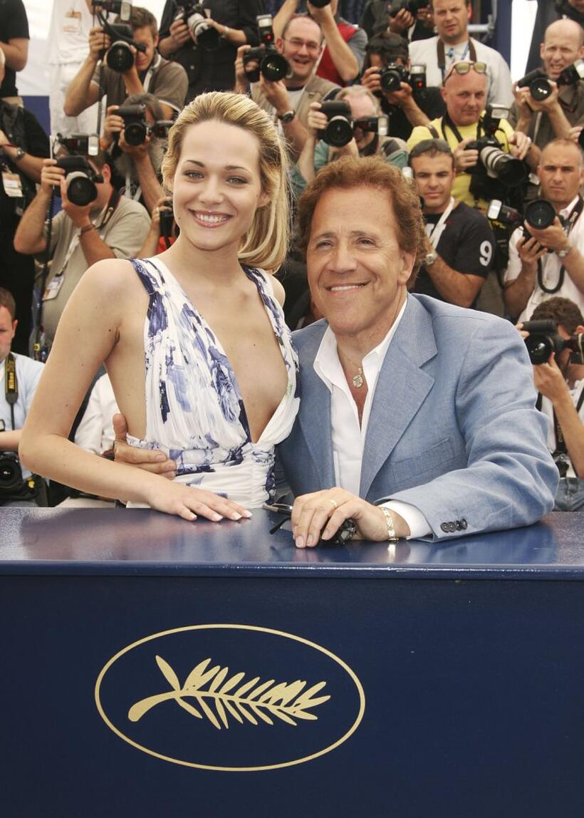 Giacomo Rizzo and Laura Chiatti at the photocall of "L'Amico Di Famiglia" during the 59th International Cannes Film Festival.