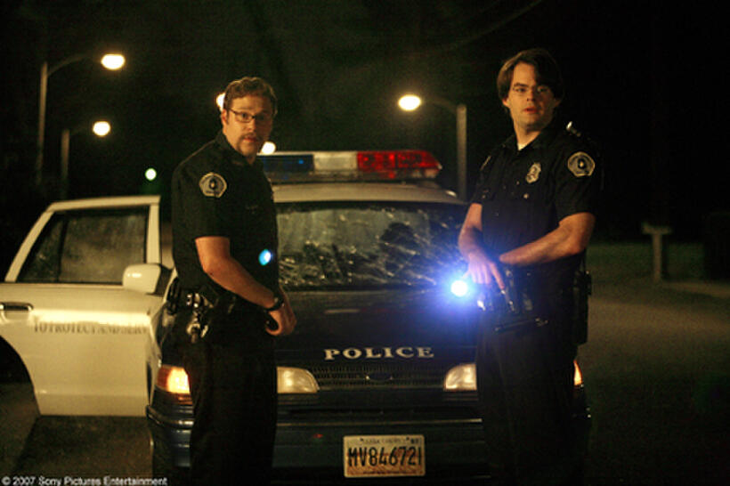 Two clueless cops, Officer Slater (Bill Hader) and Officer Michaels (Seth Rogen) in "Superbad."