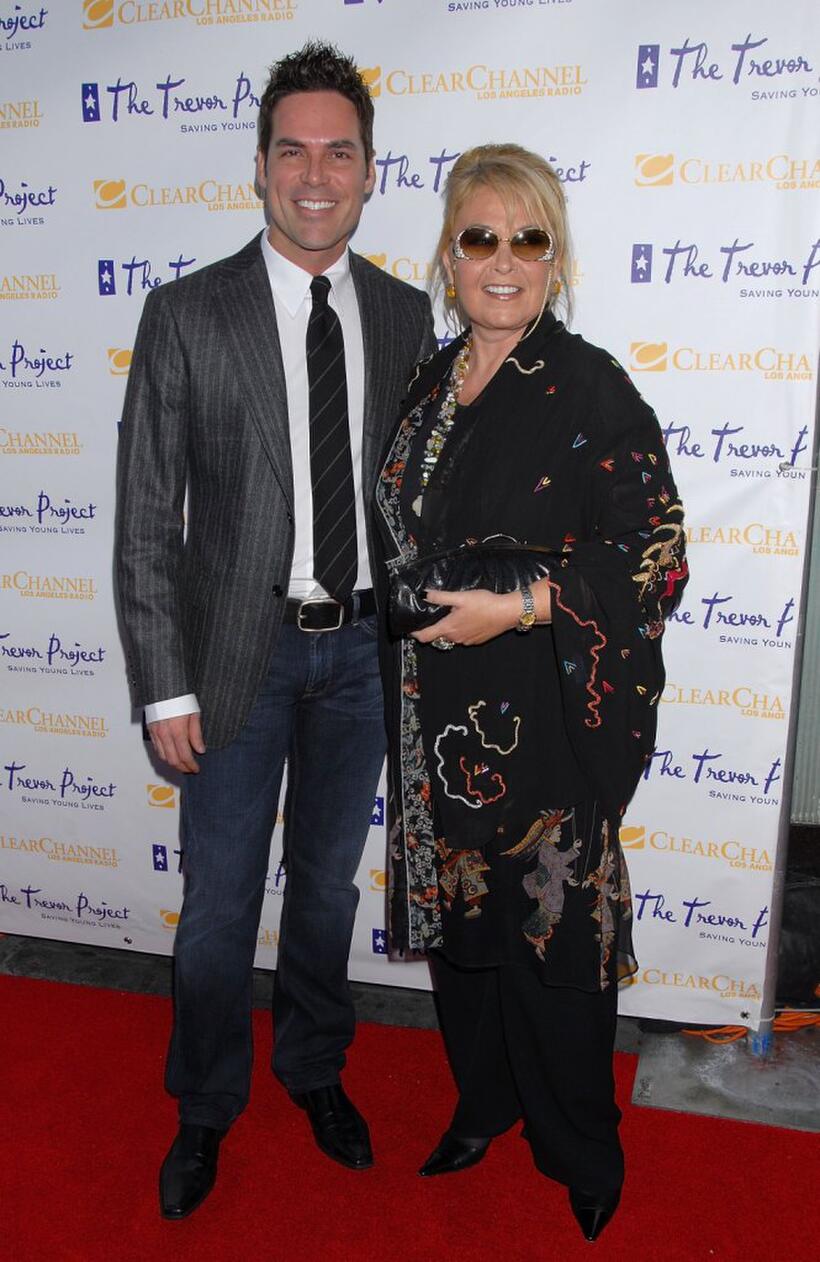 Roseanne Barr and Jorge Valencia at The Trevor Project's 9th annual Cracked XMas "Mistletoe, Mischief & Myrrh!" event.