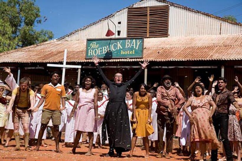 Geoffrey Rush as Father Benedictus and the cast of "Bran Nue Dae."