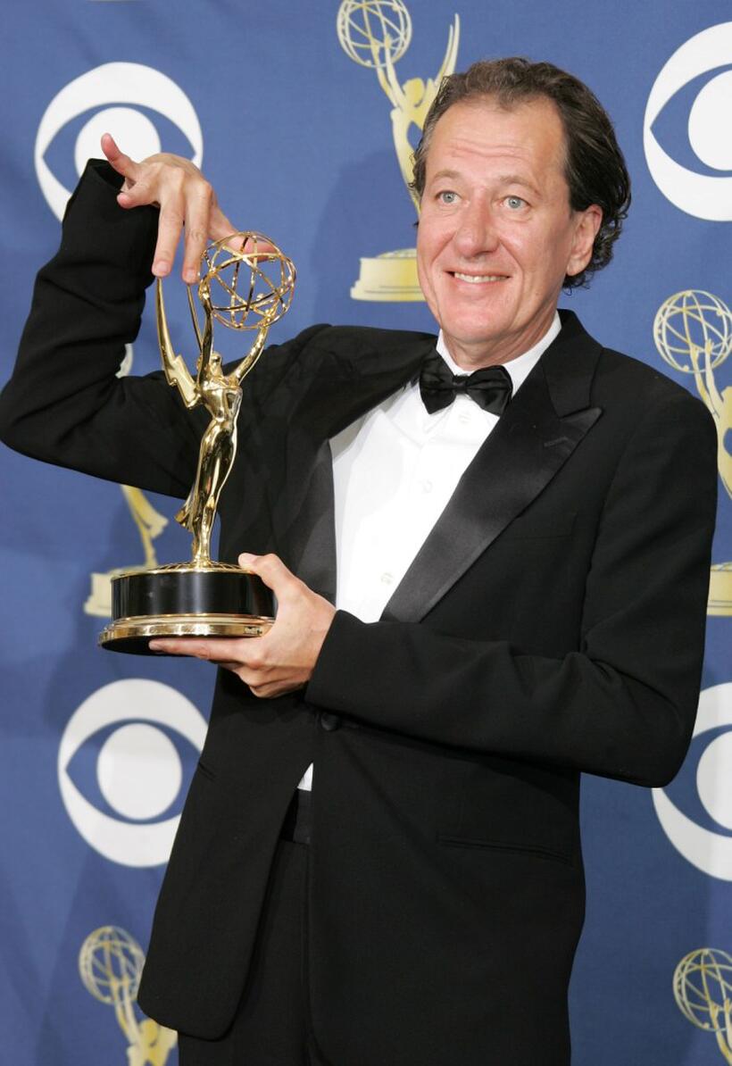 Geoffrey Rush in the press room at the 57th Annual Emmy Awards.