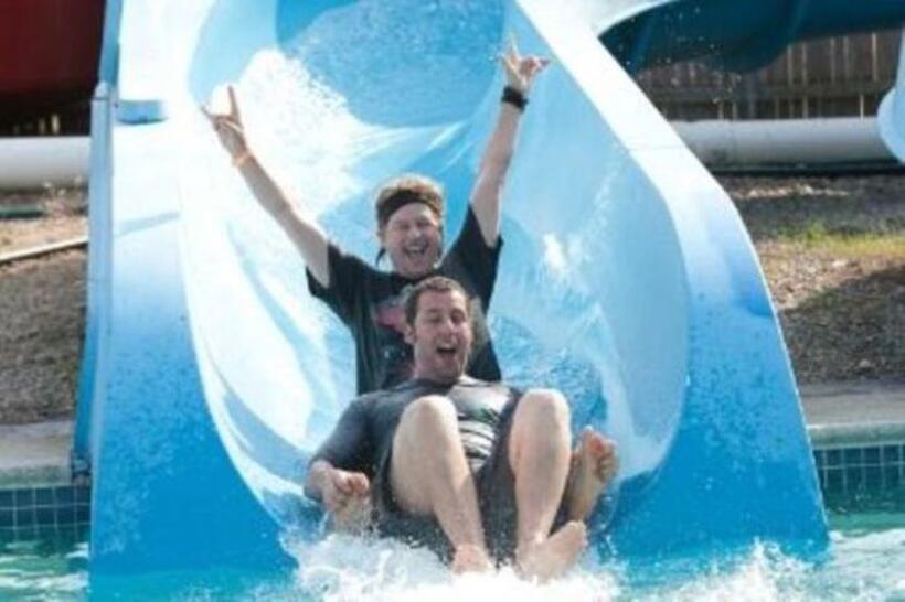 David Spade as Marcus Higgins and Adam Sandler as Lenny Feder in "Grown Ups."