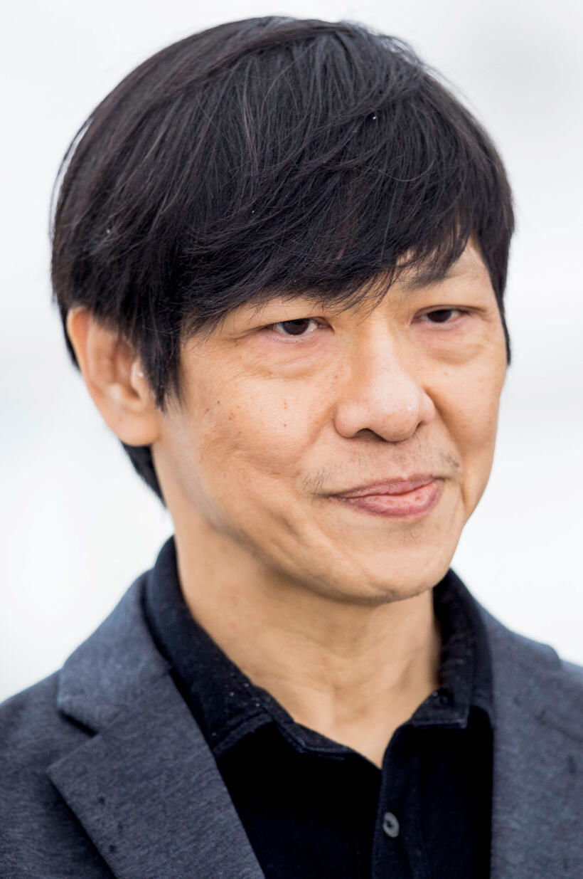 Wisit Sasanatieng at the photocall for "Ten Years In Thailand" during the 71st annual Cannes Film Festival.