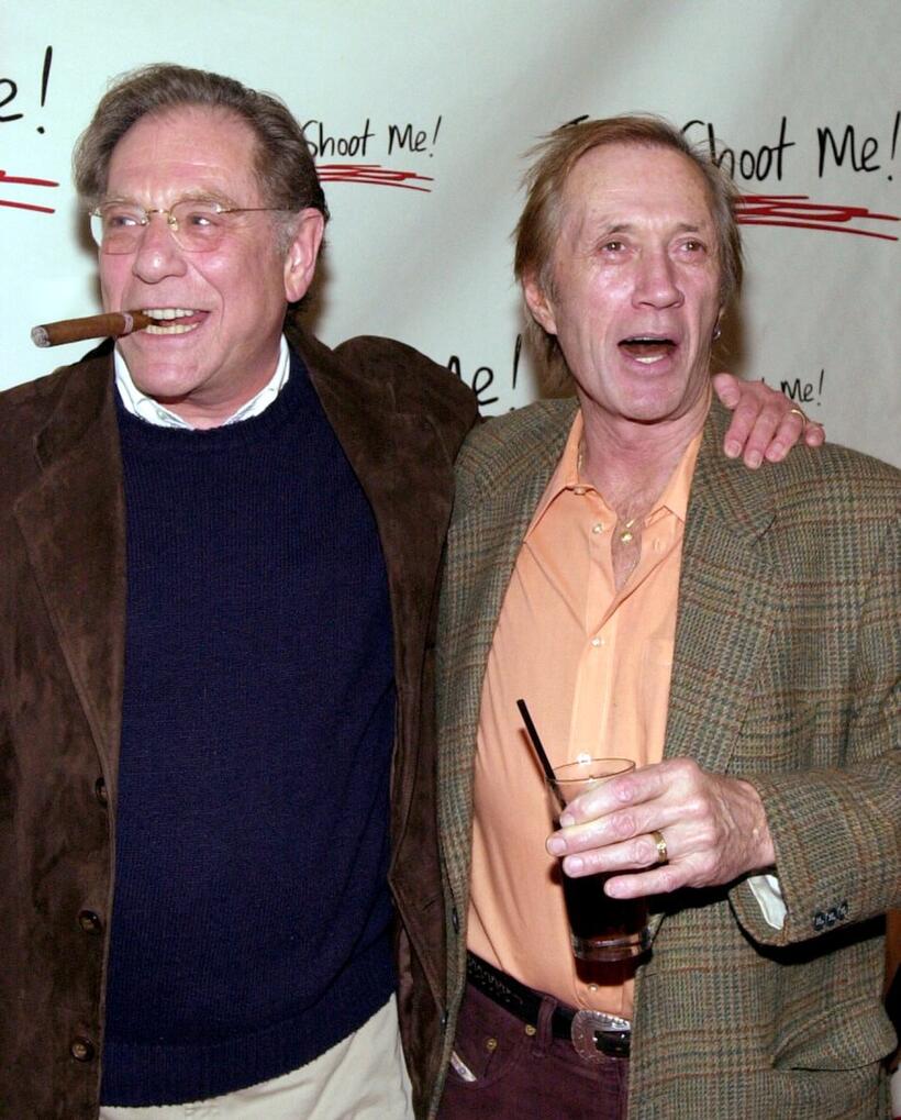 George Segal and David Carradine at the party celebrating the 100th episode of the television show "Just Shoot Me".