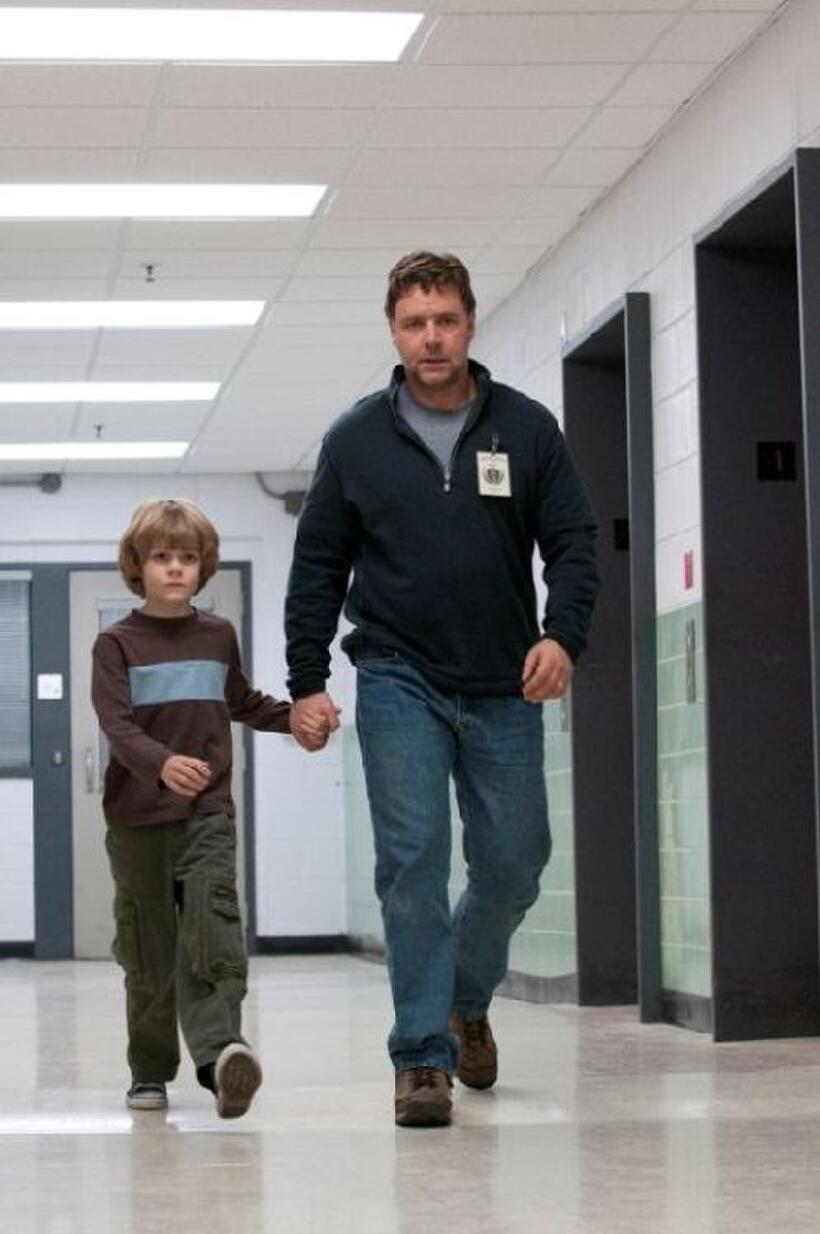 Ty Simpkins as Luke and Russell Crowe as John Brennan in "The Next Three Days."