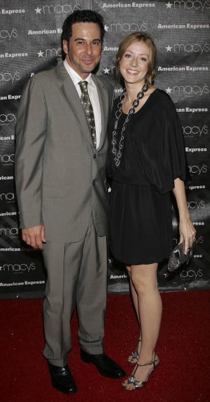 Jonathan Silverman and Jennifer Finnigan at the Macy's Passport auction and fashion show in celebration of it's 25th anniversary.