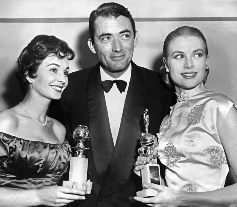 Jean Simmons, Gregory Peck and Grace Kelly at the 10th Annual Golden Globe Award in Hollywood.