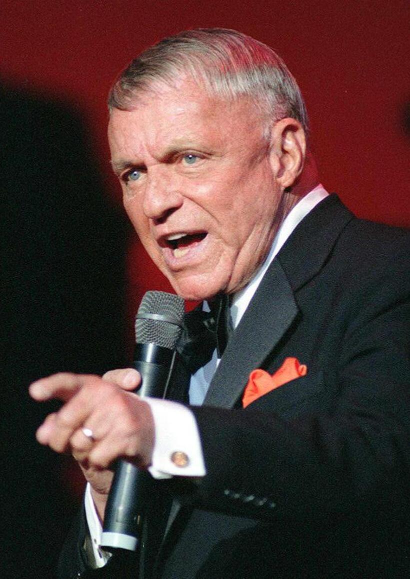 Frank Sinatra singing in Washington at the reopening of the Warner Theatre.