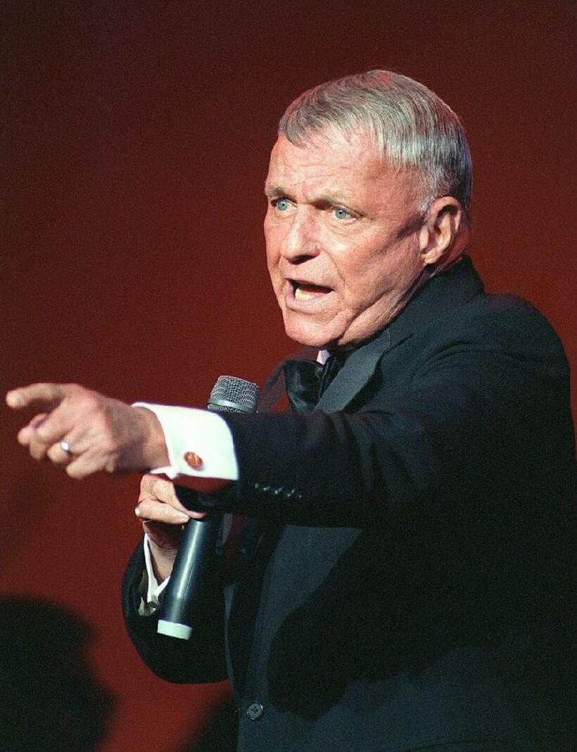 Frank Sinatra singing in Washington at the reopening of the Warner Theatre.
