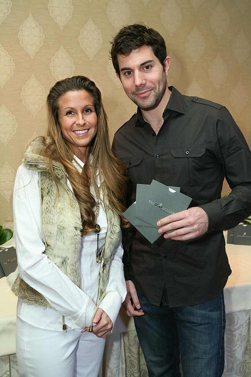 Micah Sloat and Guest at the Block 67th Annual Golden Globe Awards in California.
