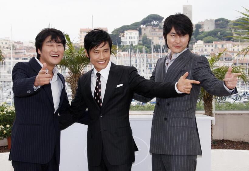 Song Kang-ho, Lee Byung-Hun and Jung Woo-Sung at the photocall of "The Good, the Bad, the Weird" during the 61st International Cannes Film Festival.
