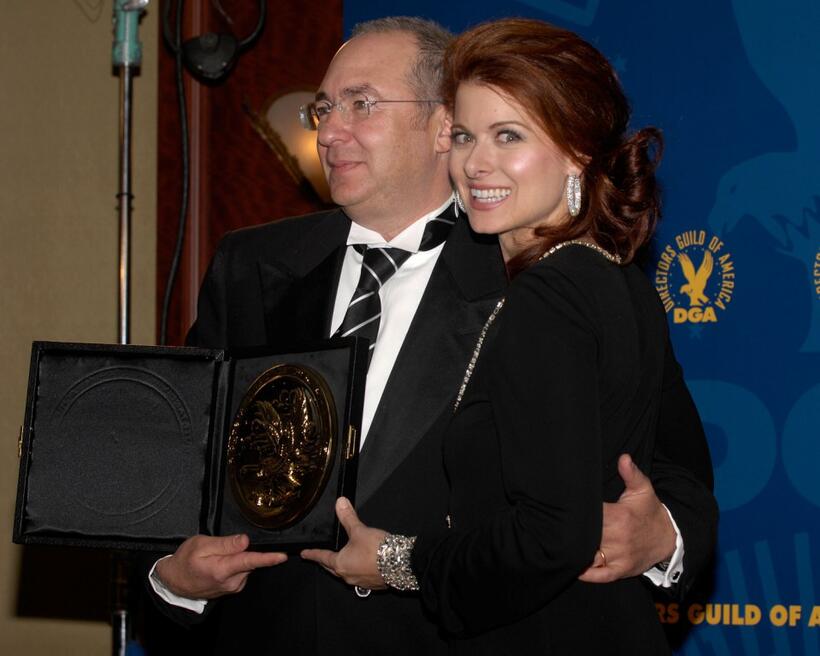 Barry Sonnenfeld and Debra Messing at the press room at the 60th annual DGA Awards held at the Hyatt Regency Century Plaza Hotel.