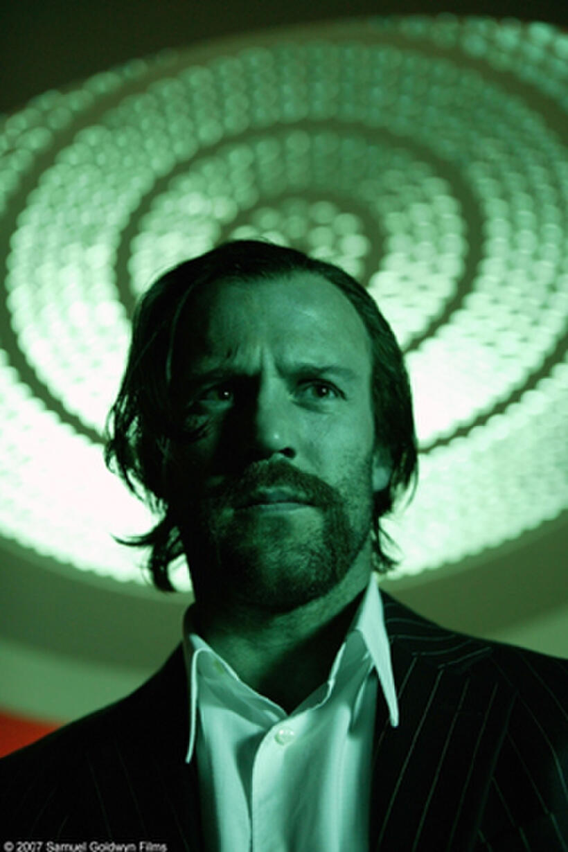 Jason Statham as Jake Green in "Revolver."
