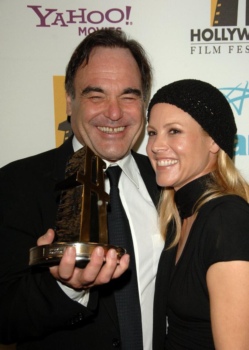 Oliver Stone and Maria Bello at The Hollywood Film Festival 10th Annual Hollywood Awards.