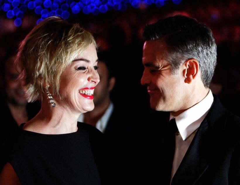 Sharon Stone and George Clooney at the opening of 4th Dubai International Film Festival.