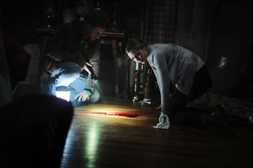 Eric Sheffer Stevens as Peter and Elizabeth Olsen as Sarah in ``Silent House.''