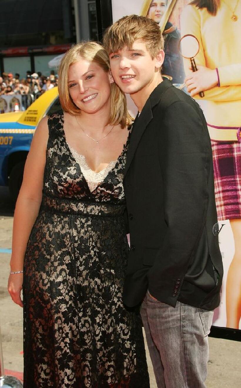 Max Thieriot and guest at the premiere of "Nancy Drew."