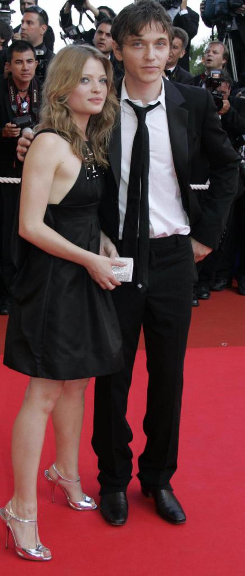 Melanie Thierry and Raphael at the screening of "Chacun Son Cinema" (To Each His Own Cinema) during the 60th edition of Cannes Film Festival.
