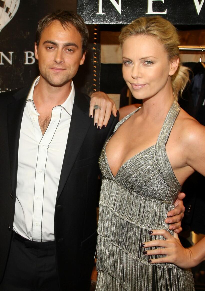 Stuart Townsend and Charlize Theron at the Barneys Celebration of Benjamin Bixby's Fall 08 - Spring 09 Menswear Collection during the Mercedes-Benz Fashion Week Spring 2009.