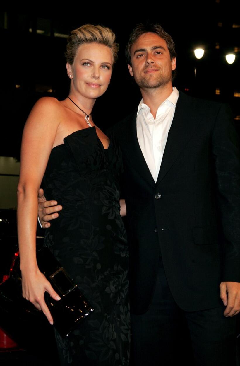 Charlize Theron and Stuart Townsend at the premiere of "North Country."
