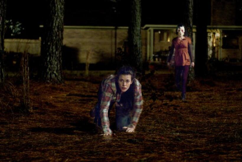 Laura Margolis as Pin-Up Girl and Liv Tyler as Kristen McKay in "The Strangers."