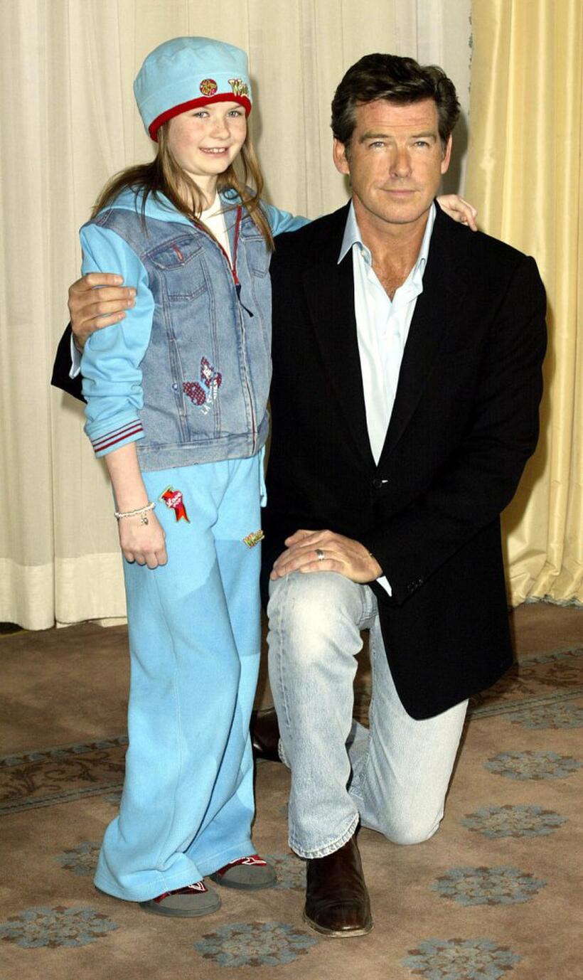 Sophie Vavasseur and Pierce Brosnan at the premiere party of "Evelyn."