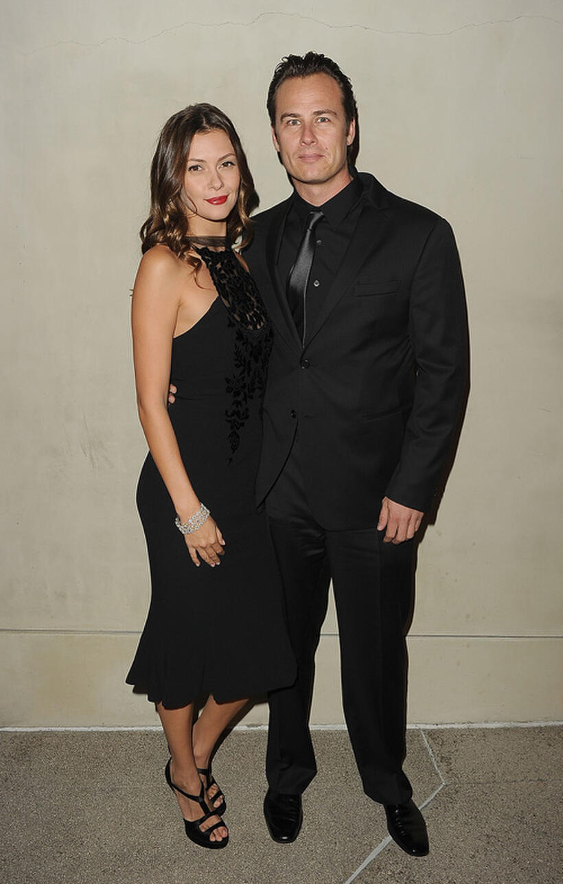 Olga Fonda and Liam Waite at the Giorgio Armani / Vanity Fair private dinner in California.