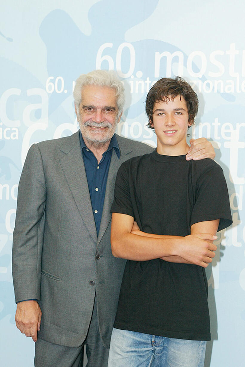 Omar Sharif and Pierre Boulanger at the photocall of "Monsieur Ibrahim et les fleurs du Coran" during the 60th Venice Film Festival in Italy.