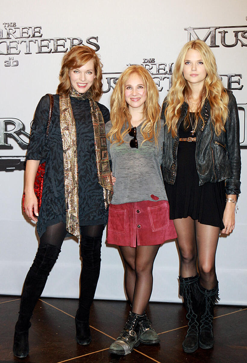 Milla Jovovich, Juno Temple and Gabriella Wilde at the photocall of "The Three Musketeers" in Germany.