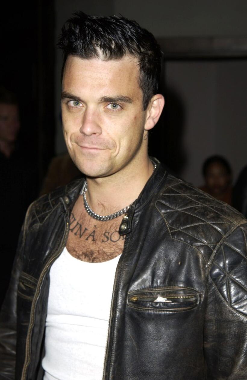 Robbie Williams at the party in celebration of Recording artist Lil Kims cover of Nylon magazines summer issue.