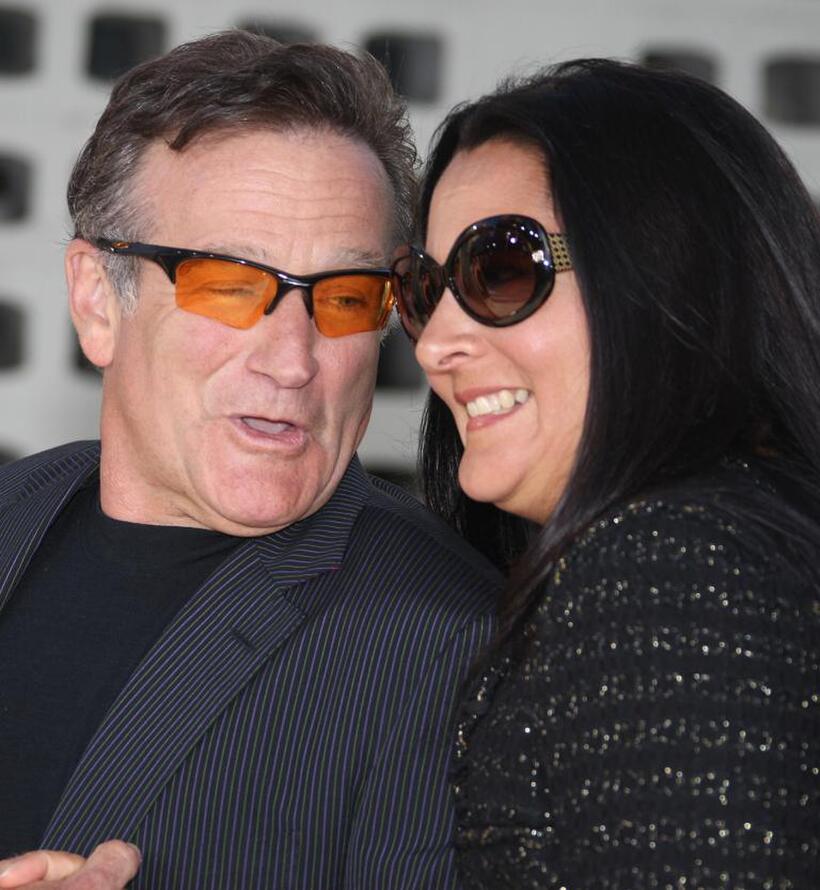 Robin Williams and his wife Marsha Garces Williams at the world premiere of the film "License to "Wed".