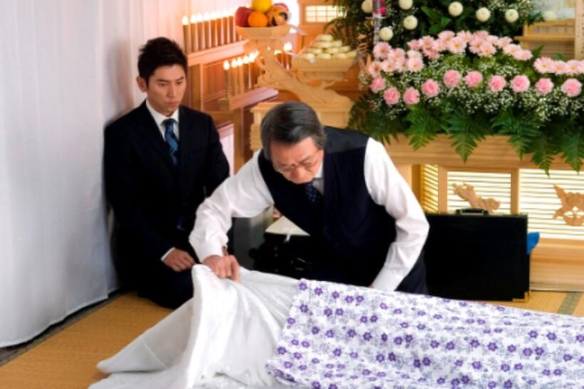 Masahiro Motoki as Daigo Kobayashi and Tsutomu Yamazaki as Sasaki in "Departures."
