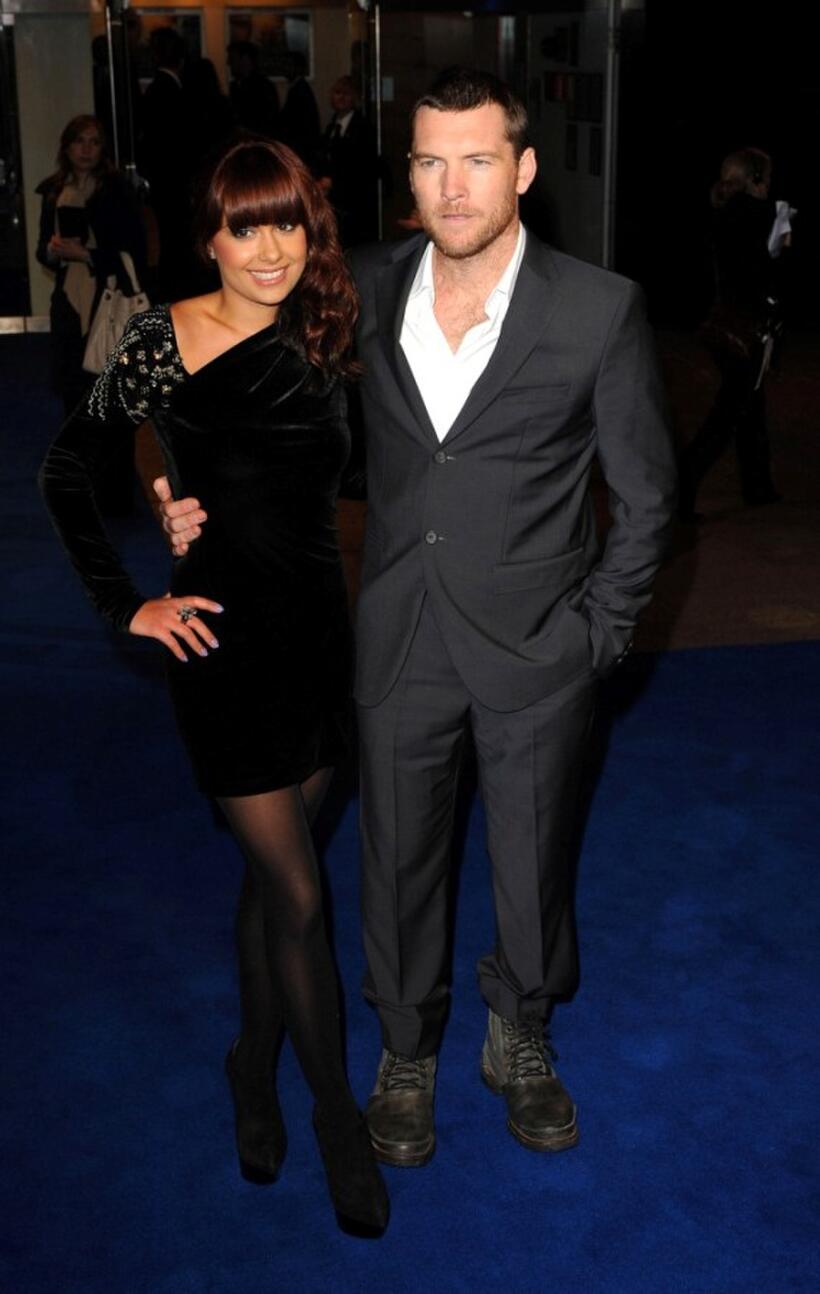 Sam Worthington and Guest at the world premiere of "Avatar."