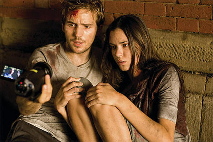 Michael Stahl-David and Odette Yustman in "Cloverfield."