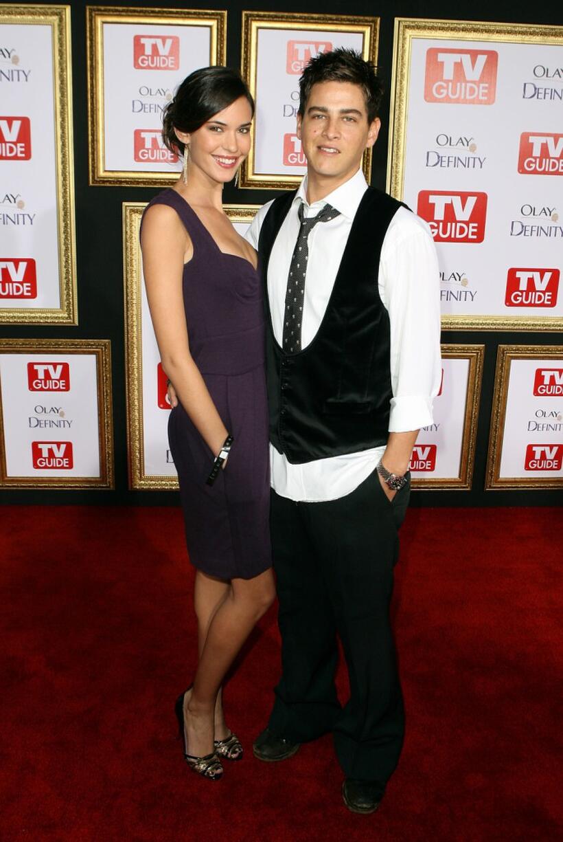 Odette Yustman and guest at the TV Guide's 5th Annual Emmy Party.