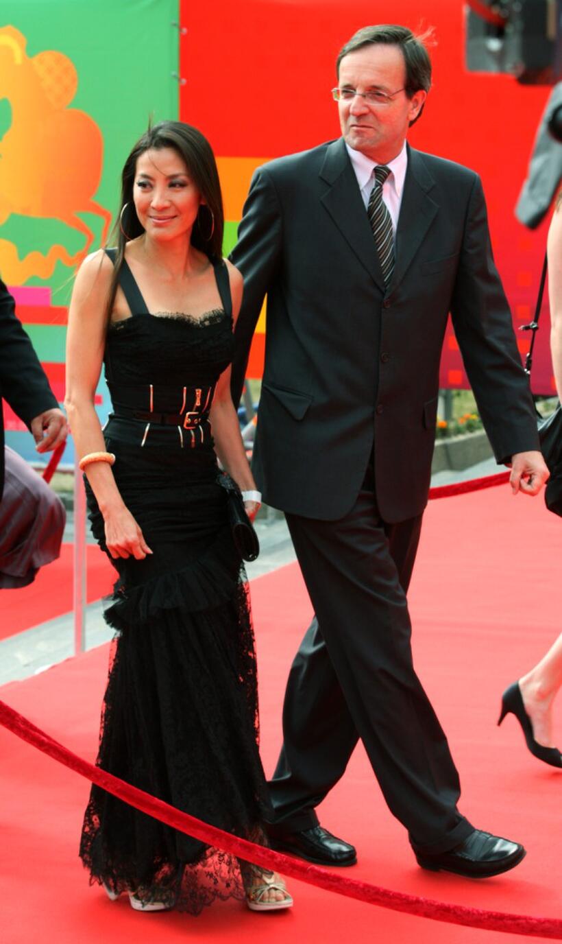 Michelle Yeoh and Georges Chichmanov of LOreal at the closing ceremony of International Moscow Film Festival.