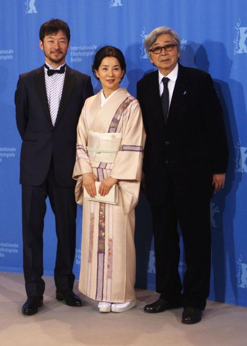 Tadanobu Asano, Sayuri Yoshinaga and director Yoji Yamada at the photocall of "Our Mother" during the 58th Berlinale Film Festival.