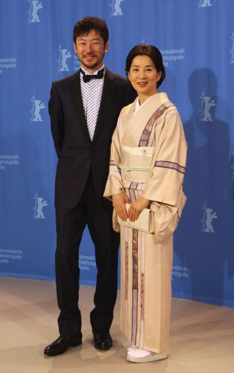 Tadanobu Asano and Sayuri Yoshinaga at the photocall of "Our Mother" during the 58th Berlinale Film Festival.