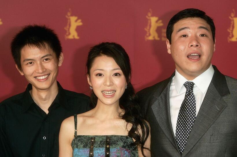 Lu Yulai, Zhang Jingchu and Feng Li pose at the photocall of "Kong Que" during the 55th annual Berlinale International Film Festival.