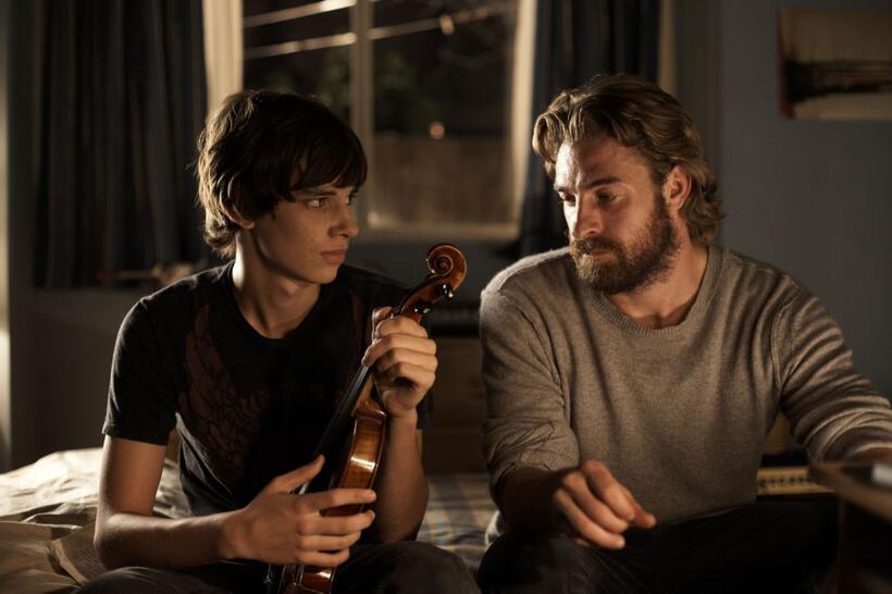 Devon Bostwick as Simon and Scott Speedman as Tom in "Adoration."
