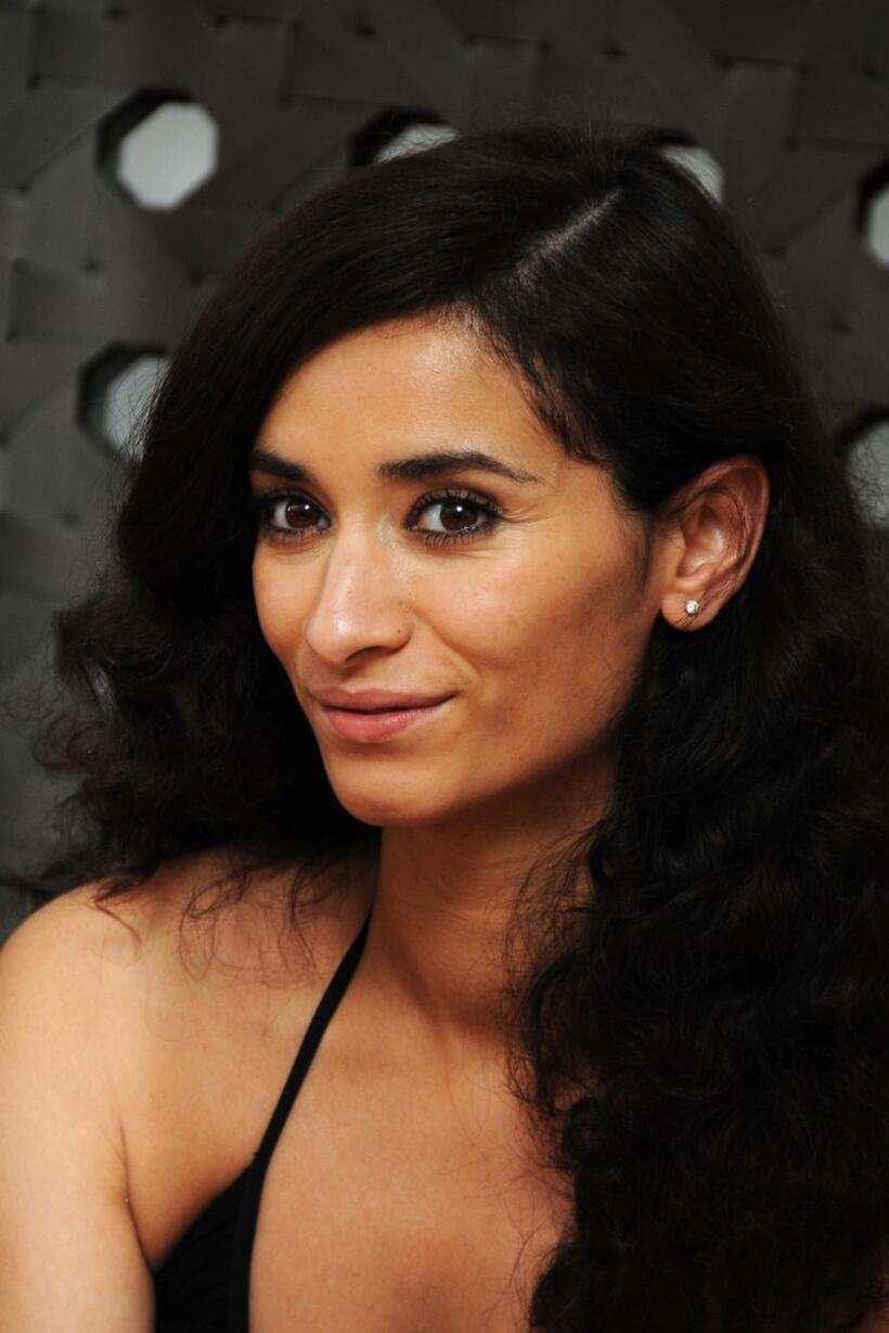 Rachida Brakni at the photocall of "Art You Up For The Planet" during the 62nd International Cannes Film Festival.