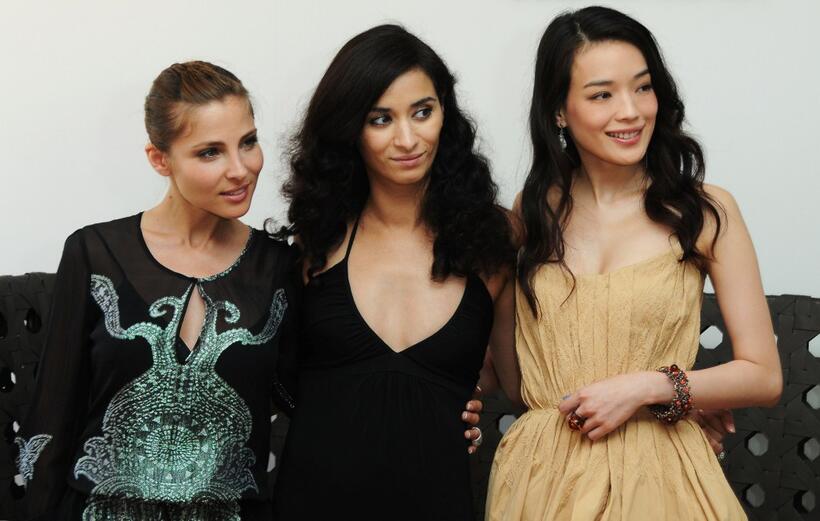 Elsa Pataky, Rachida Brakni and Shu Qi at the photocall of "Art You Up For The Planet" during the 62nd International Cannes Film Festival.