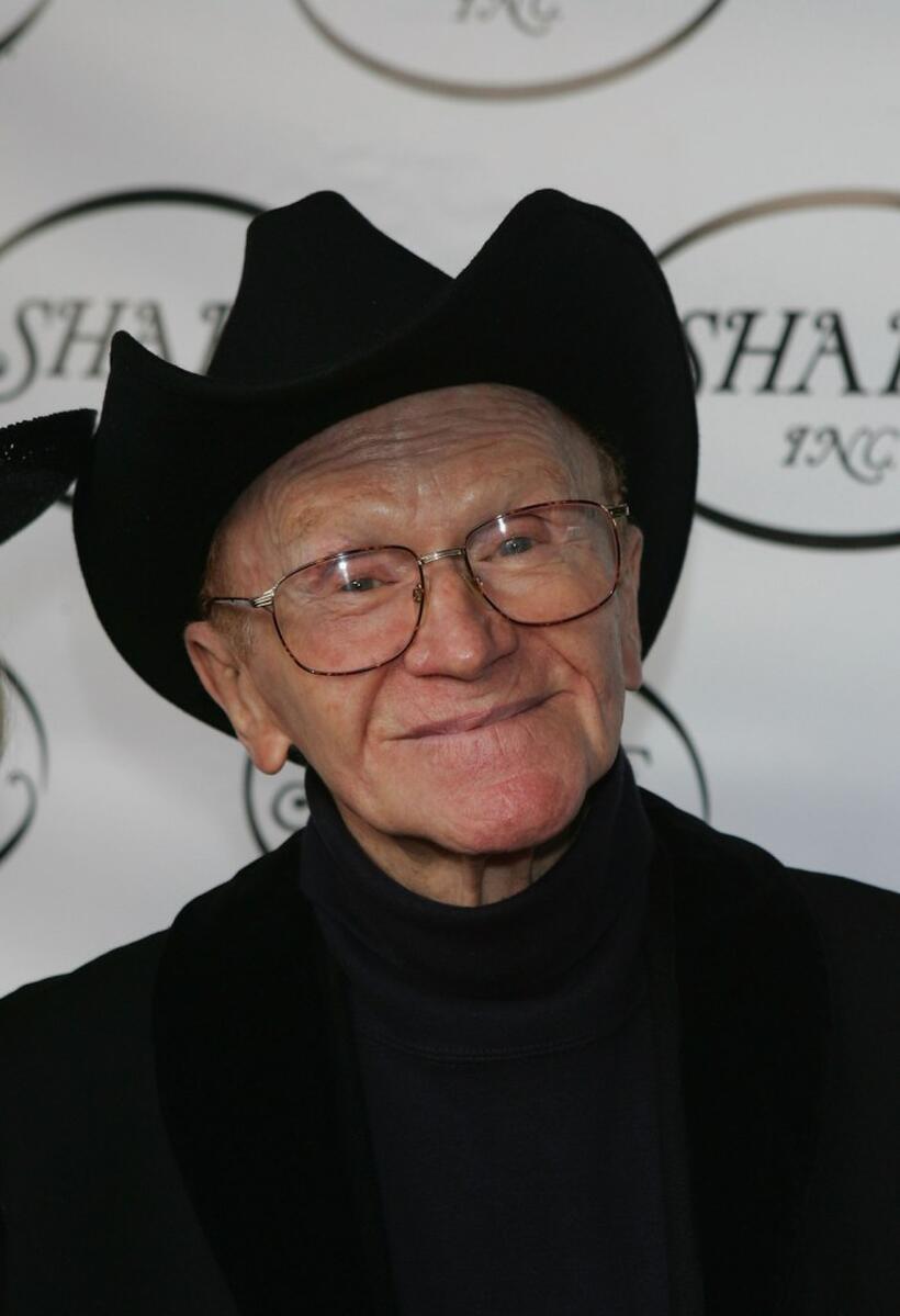 Red Buttons at the Share Inc's 52nd Annual Boomtown party.