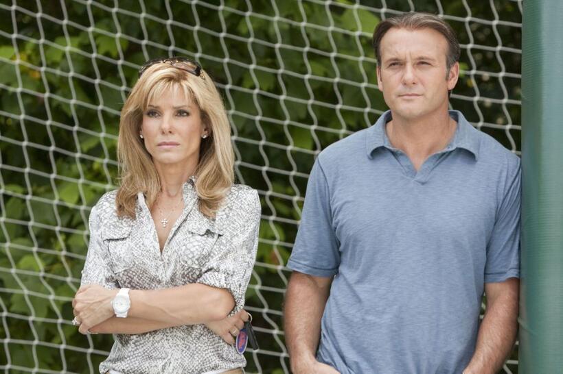 Sandra Bullock as Leigh Anne Tuohy and Tim Mcgraw as Sean Tuohy in "The Blind Side."