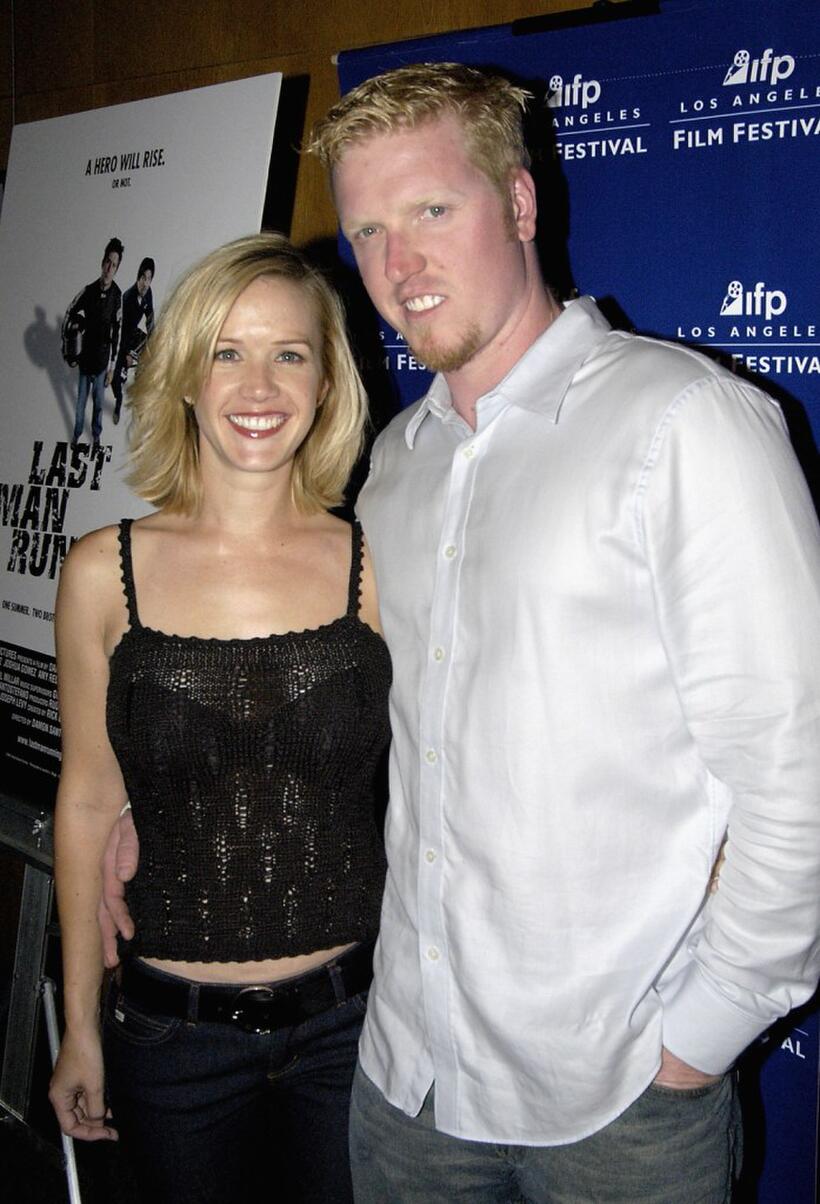 Jake Busey and guest at the premiere of "Last Man Running".