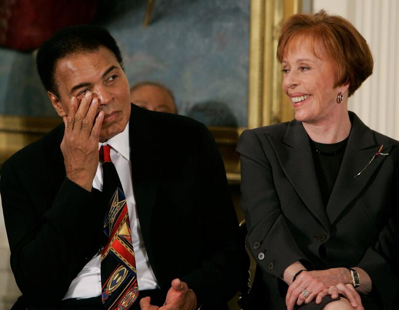 Carol Burnett and Muhammad Ali for a ceremony at the White House.