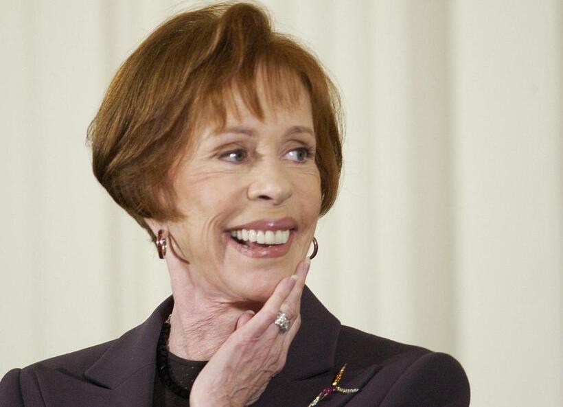 Carol Burnett attend a ceremony at the White House.